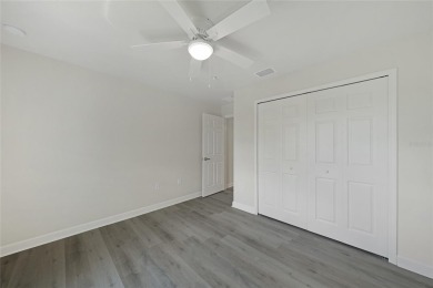 This nearly completed WATERFRONT TRIPLEX in Rotonda West, FL, is