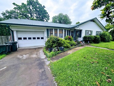 Welcome to this inviting 3-bedroom, 2-bath home located in a - photo 5