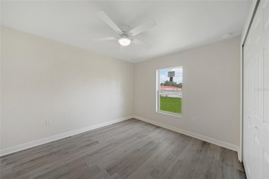 This nearly completed WATERFRONT TRIPLEX in Rotonda West, FL, is