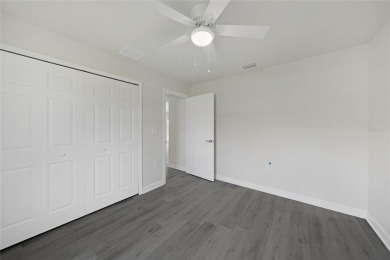 This nearly completed WATERFRONT TRIPLEX in Rotonda West, FL, is