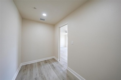 This nearly completed WATERFRONT TRIPLEX in Rotonda West, FL, is