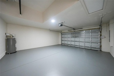 This nearly completed WATERFRONT TRIPLEX in Rotonda West, FL, is