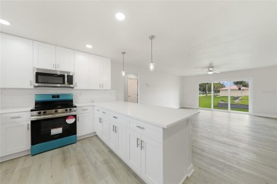 This nearly completed WATERFRONT TRIPLEX in Rotonda West, FL, is