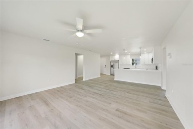 This nearly completed WATERFRONT TRIPLEX in Rotonda West, FL, is