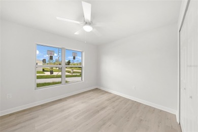 This nearly completed WATERFRONT TRIPLEX in Rotonda West, FL, is