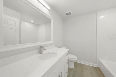 This nearly completed WATERFRONT TRIPLEX in Rotonda West, FL, is