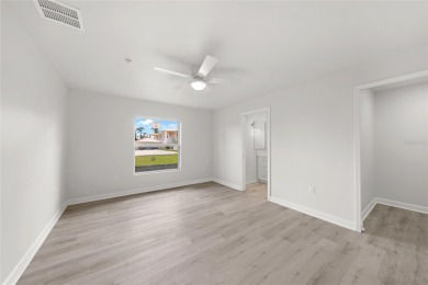 This nearly completed WATERFRONT TRIPLEX in Rotonda West, FL, is