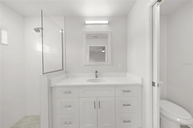 This nearly completed WATERFRONT TRIPLEX in Rotonda West, FL, is