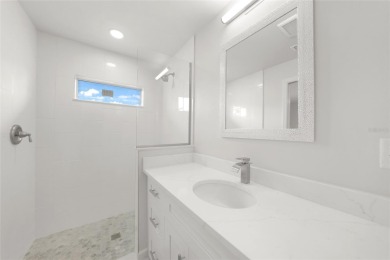 This nearly completed WATERFRONT TRIPLEX in Rotonda West, FL, is