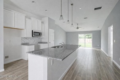 BRAND NEW CONSTRUCTION! This 4BR/2BA home is just 4.2 mi from - photo 3
