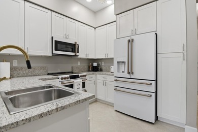 This impeccably maintained loft delivers the perfect blend of - photo 3