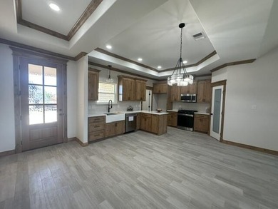 Another stunning creation by Deluxe Custom Homes! This 4-bedroom - photo 4