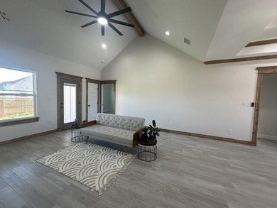 Another stunning creation by Deluxe Custom Homes! This 4-bedroom - photo 5