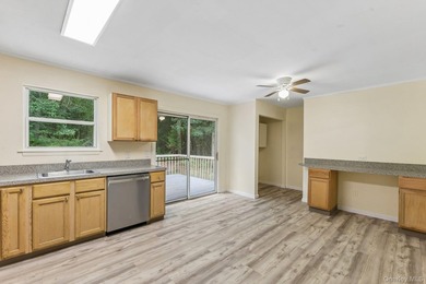 Tucked away on just over an acre in a private, wooded setting - photo 13