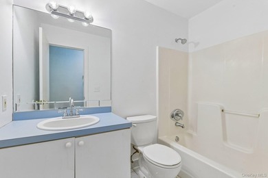 Tucked away on just over an acre in a private, wooded setting - photo 15