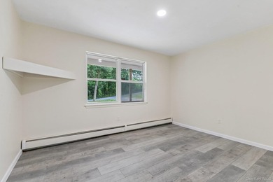 Tucked away on just over an acre in a private, wooded setting - photo 17