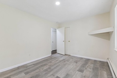 Tucked away on just over an acre in a private, wooded setting - photo 18