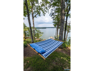 This gorgeous 2-story home w/spectacular waterfront views of - photo 18