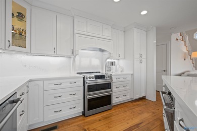 This gorgeous 2-story home w/spectacular waterfront views of - photo 26