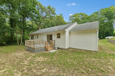 Tucked away on just over an acre in a private, wooded setting - photo 30