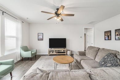 This homes comfortable floor plan opens to a foyer with dining - photo 12