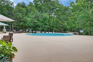 Surrounded by mature trees and natural Ozarks beauty, this - photo 13