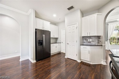 The spacious, open-concept floor plan features two living areas - photo 8