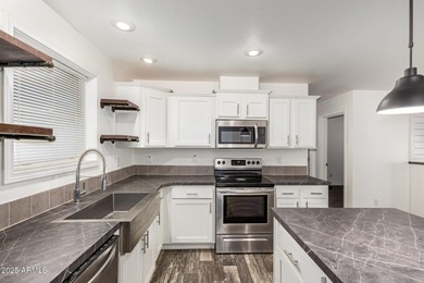 Delightful 3BR manufactured home on over 1.6 acres of land! This