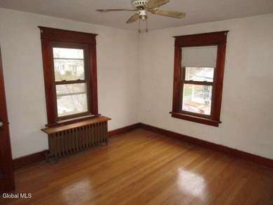 The charming Rensselaer Colonial features 3 spacious bedrooms, 1 - photo 8