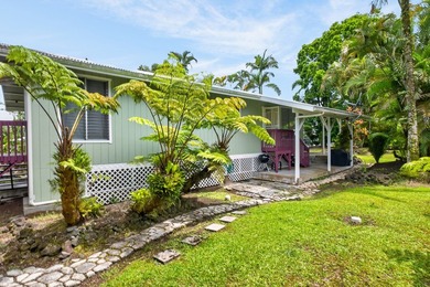 Nestled on a beautifully landscaped, fairly level lot surrounded - photo 1