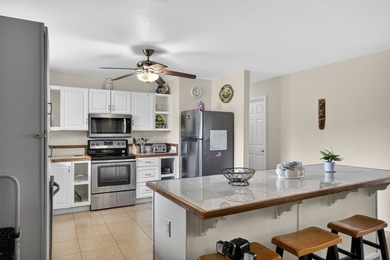 Nestled on a beautifully landscaped, fairly level lot surrounded - photo 3