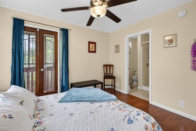 Nestled on a beautifully landscaped, fairly level lot surrounded - photo 7