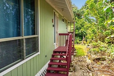 Nestled on a beautifully landscaped, fairly level lot surrounded - photo 10