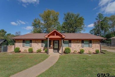 Welcome to this inviting 3-bedroom, 2 bath brick home featuring - photo 3