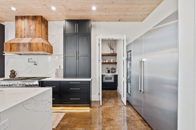 Custom-crafted and completed in 2025, this exceptional 5BD/5.5BA - photo 31