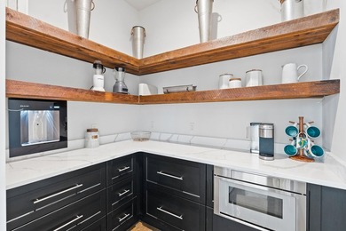 Custom-crafted and completed in 2025, this exceptional 5BD/5.5BA - photo 32