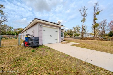 Built in 2021 and located in Atlantic Boulevard Estates, this - photo 3