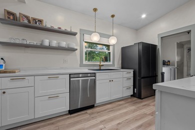 A quiet ranch wrapped in mature trees, soft natural light, and a - photo 2