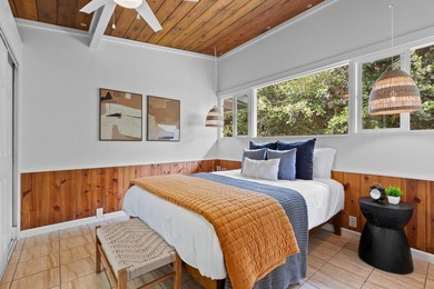 Tropical flexibility meets island charm on this fully fenced - photo 10