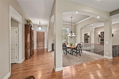 Welcome home! Step thru the impressive entry, soaring ceilings - photo 9