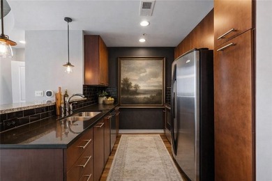 Perched on the 28th floor of Realm, this stunning one-bedroom