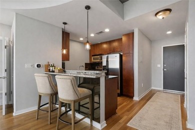 Perched on the 28th floor of Realm, this stunning one-bedroom