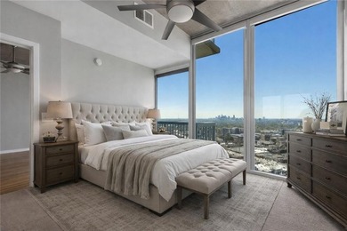 Perched on the 28th floor of Realm, this stunning one-bedroom