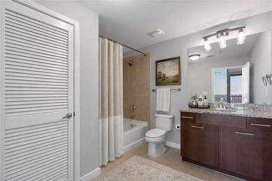 Perched on the 28th floor of Realm, this stunning one-bedroom