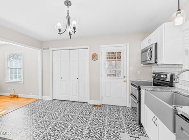 Charming, fully updated bungalow on just under 1/2 acre --