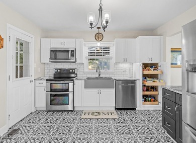 Charming, fully updated bungalow on just under 1/2 acre --