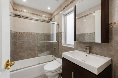 Welcome to 2117 East 73rd Street, a one-of-a-kind Center Hall - photo 15
