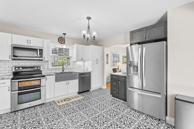 Charming, fully updated bungalow on just under 1/2 acre --