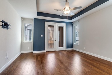 This jewel in the gated Merion community offers refined