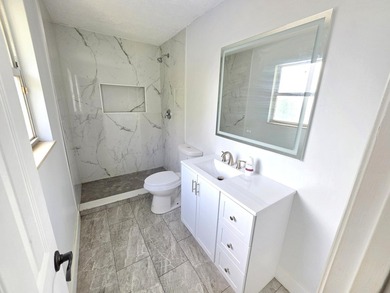 Discover this 3-bedroom, 2-bathroom home features an attached - photo 11